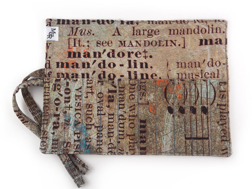 Handmade brush and pencil roll in text print fabric