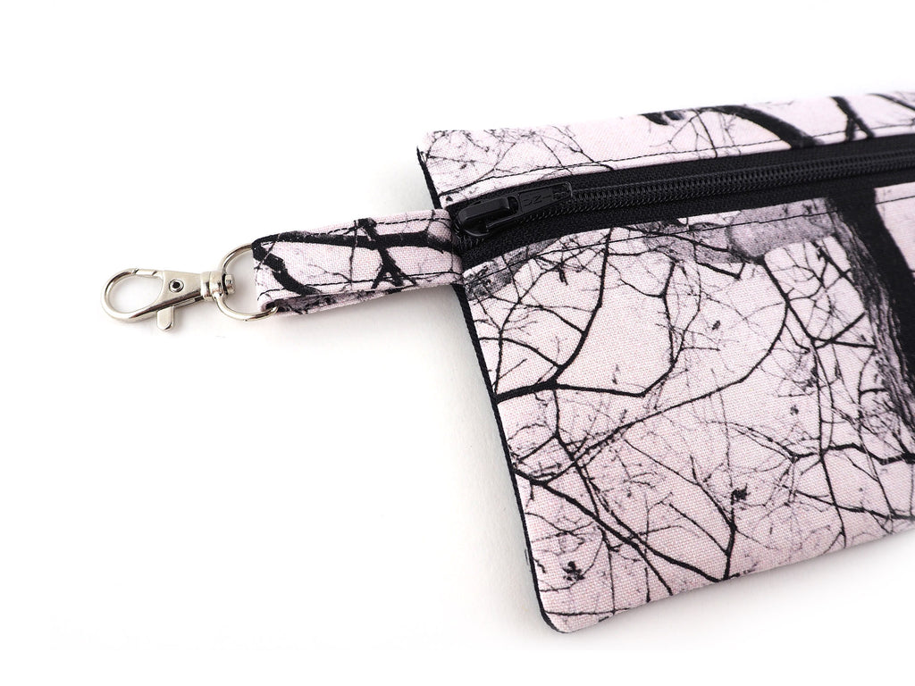 Handmade zipper pouch in tree print fabric with clasp