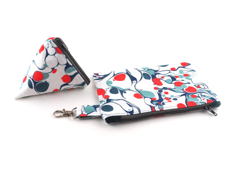 Handmade zipper pouches in marble print designer fabric