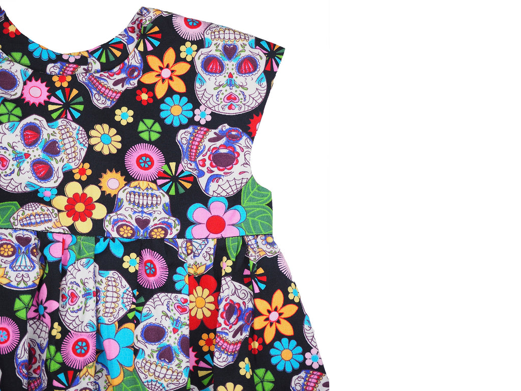 Multi coloured dress in skull print fabric