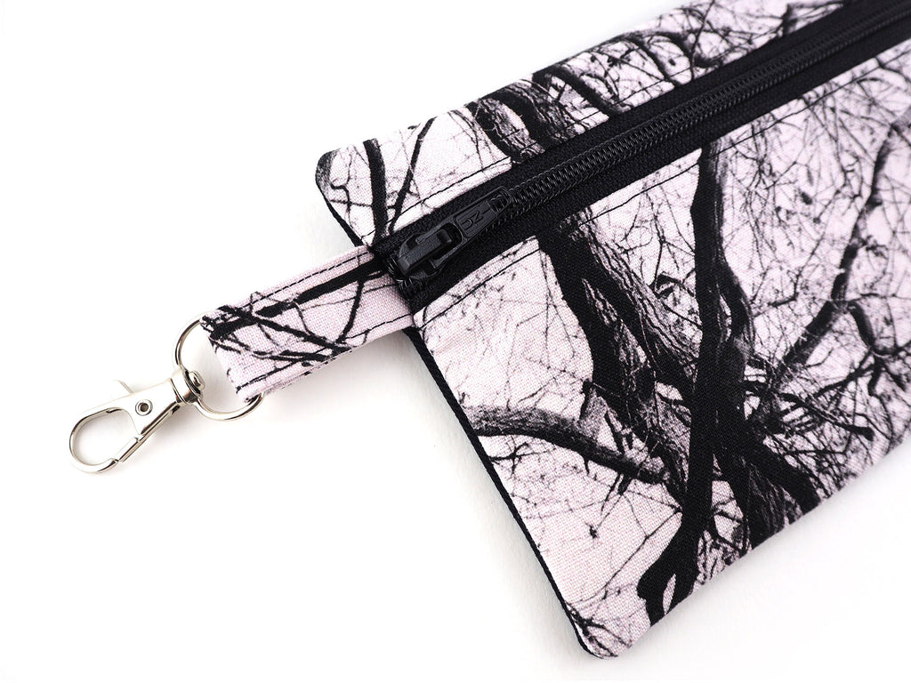 Monochrome tree print travel pouch with clasp